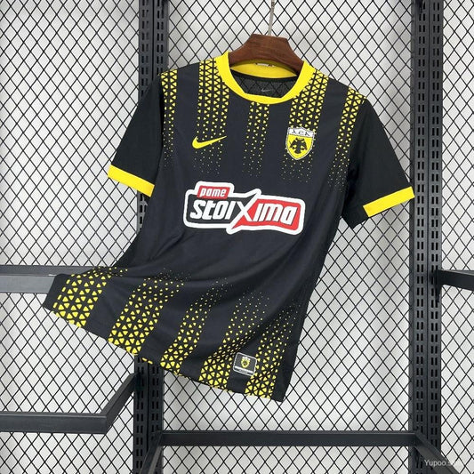 Camisola AEK Atenas 2025-26 Alternativa Preta Versão Adepto
