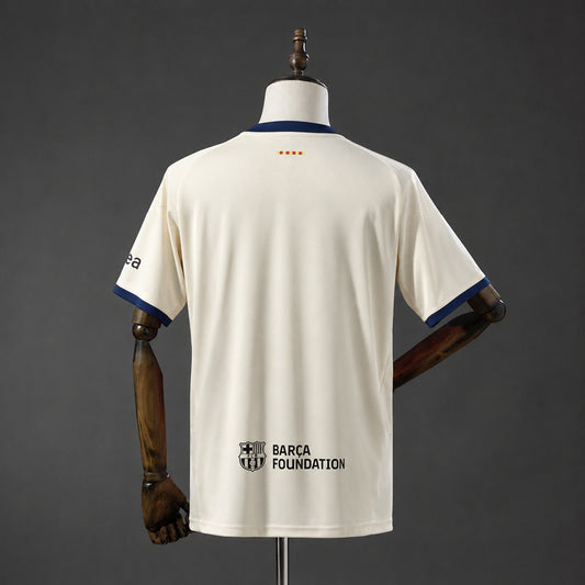 Camisola FC Barcelona 2026-27 Alternativa Creme Versão Adepto