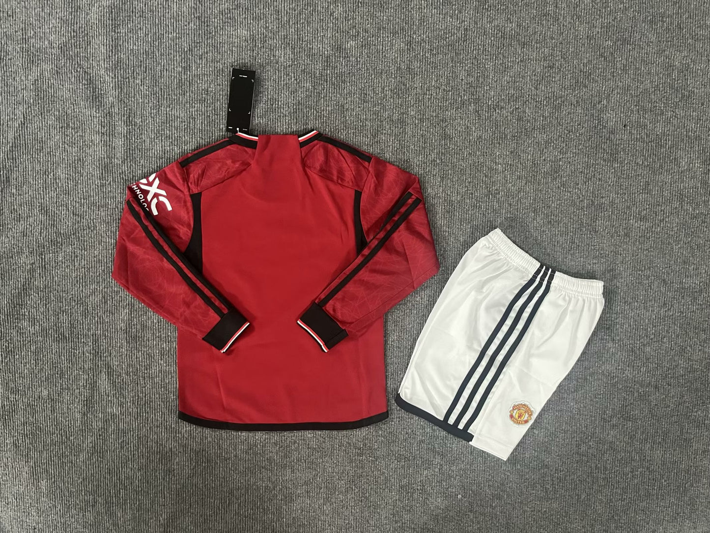 Kit Criança Manga Comprida M-United 2023-24 Principal