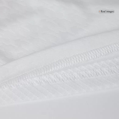 Camisola Real Madrid CF 2024-25 Principal Versão Adepto