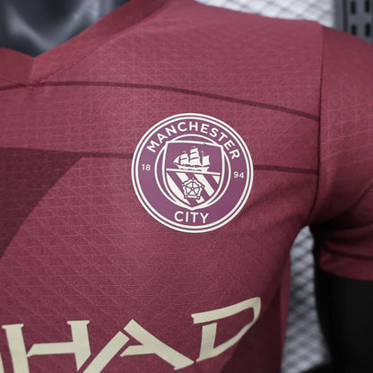 Camisola MCI 2024-25 Alternativa Vermelha Versão Jogador