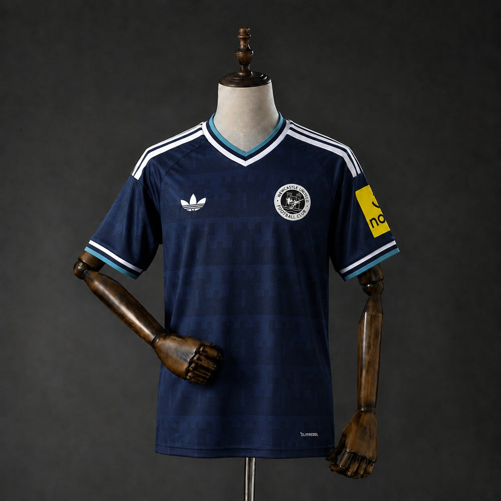Camisola NCU 2026-27 Alternativa Azul Lisa Versão Adepto