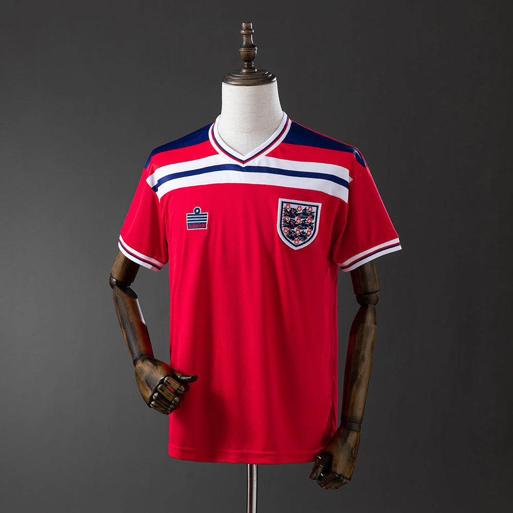 Camisola Inglaterra 1982 Alternativa Vermelha Versão Adepto