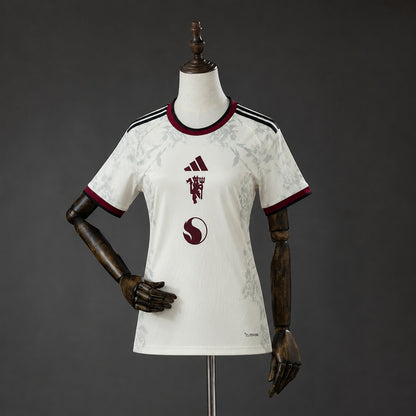 Camisola M-UNITED 2026-27 Alternativa Branca Versão Mulher