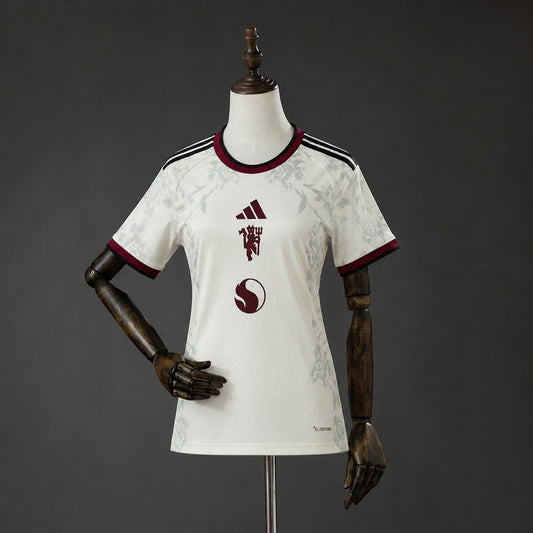 Camisola M-UNITED 2026-27 Alternativa Branca Versão Mulher