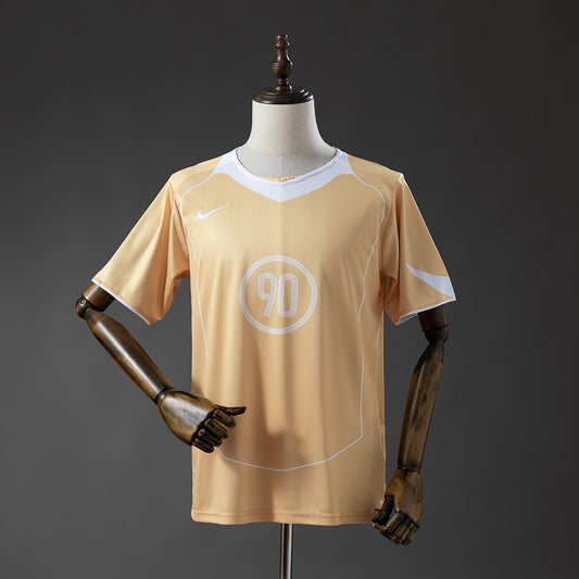 Camisola N.I.K.E. Total90 2025-26 Amarela