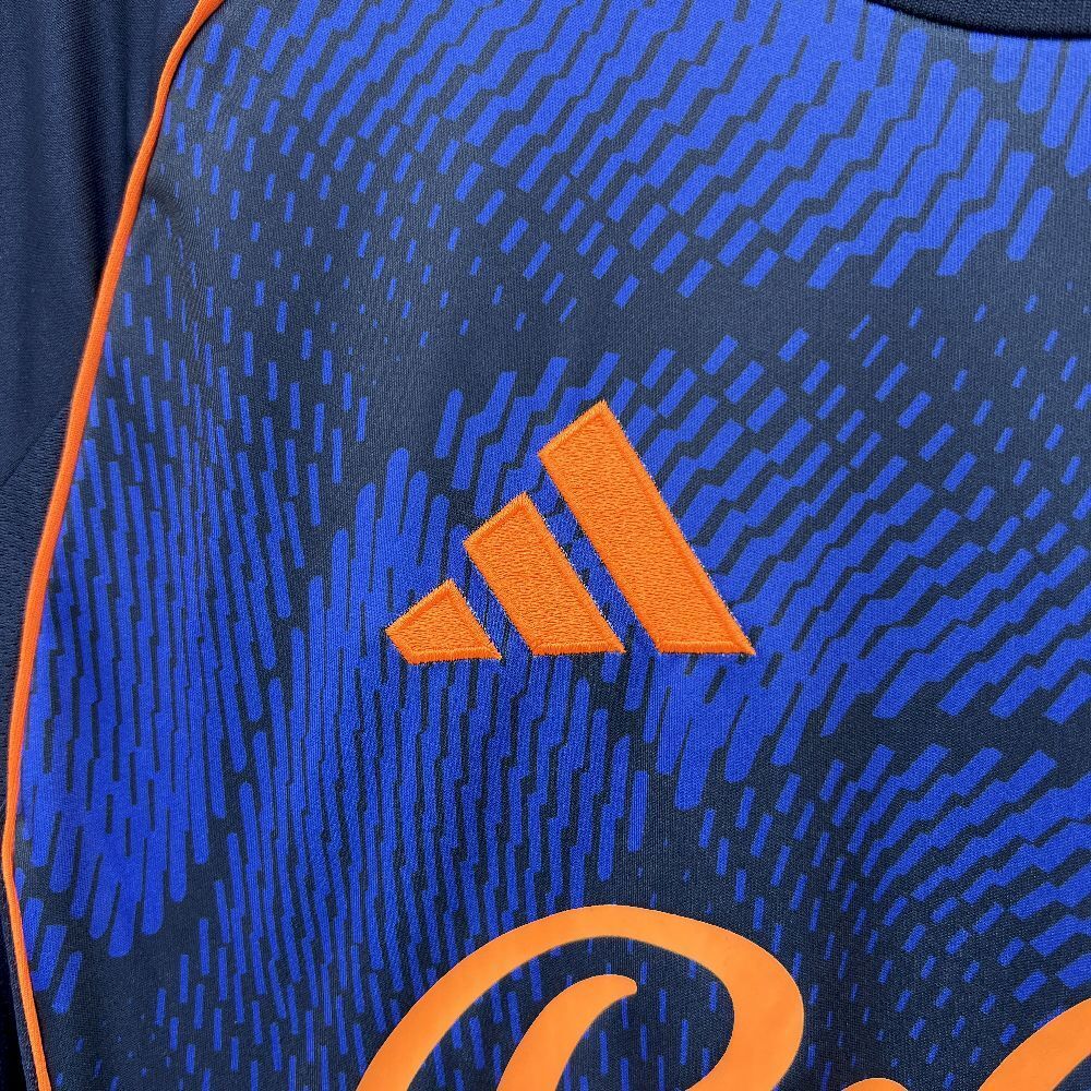 Camisola NOT-FOR 2025-26 Alternativa Azul Versão Adepto