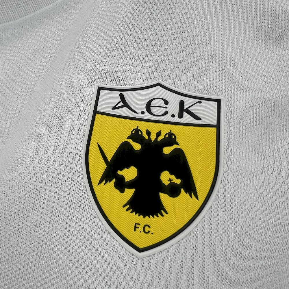 Camisola AEK Atenas 2025-26 Alternativa Branca Versão Adepto