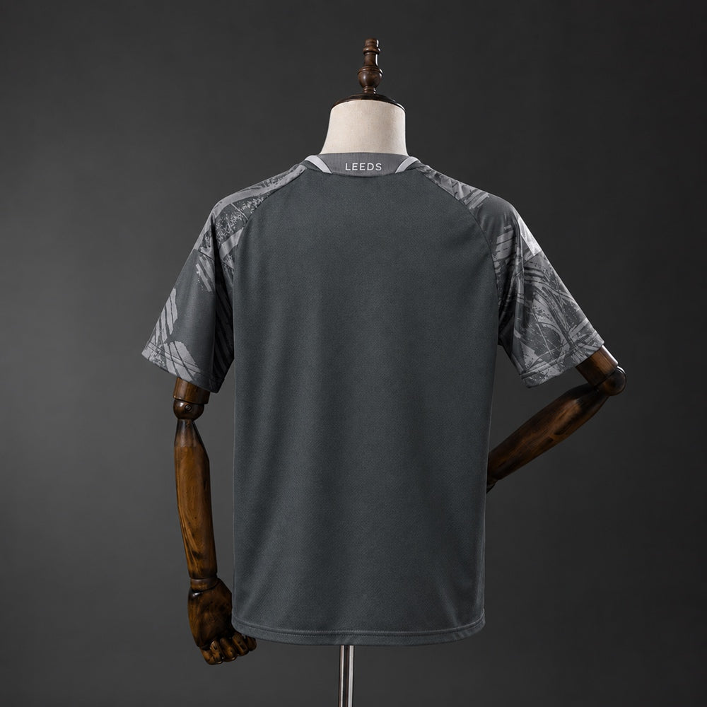 Camisola Leeds-U 2026-27 Alternativa Preta Versão Adepto