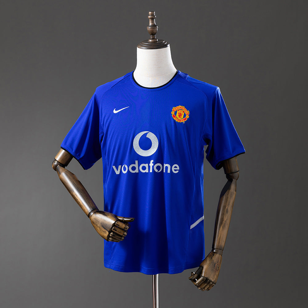 Camisola M-UNITED 2002-03 Alternativa Azul Versão Adepto
