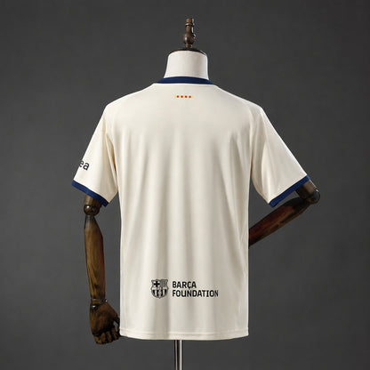 Camisola FC Barcelona 2026-27 Alternativa Creme Versão Adepto
