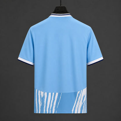 Camisola NOT-FOR 2026-27 Alternativa Azul Versão Adepto