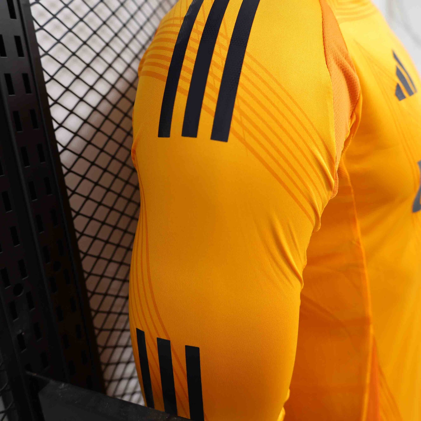 Camisola Manga Comprida Real Madrid CF 2024-25 Alternativa Laranja Versão Jogador