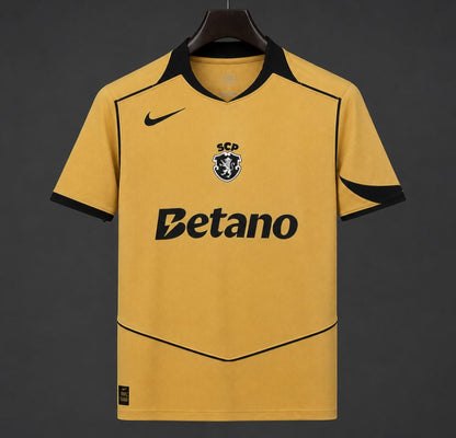 Camisola S.C.P. 2026-27 Alternativa Amarela Lisa Versão Adepto