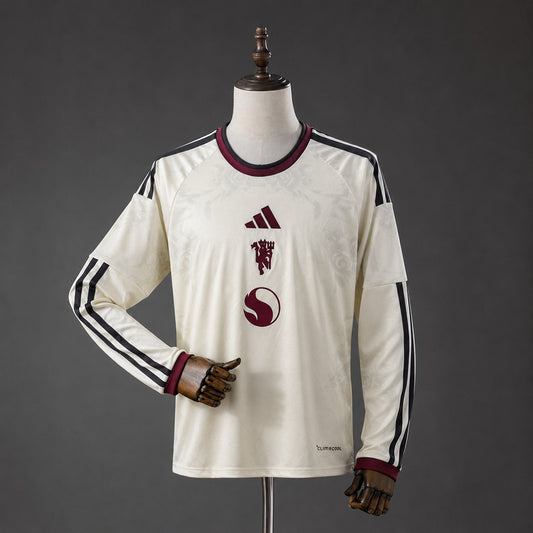 Camisola Manga Comprida M-UNITED 2026-27 Alternativa Branca Versão Adepto