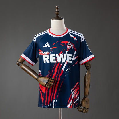 Camisola 1.FC Koln 2026-27 Alternativa Azul Versão Adepto