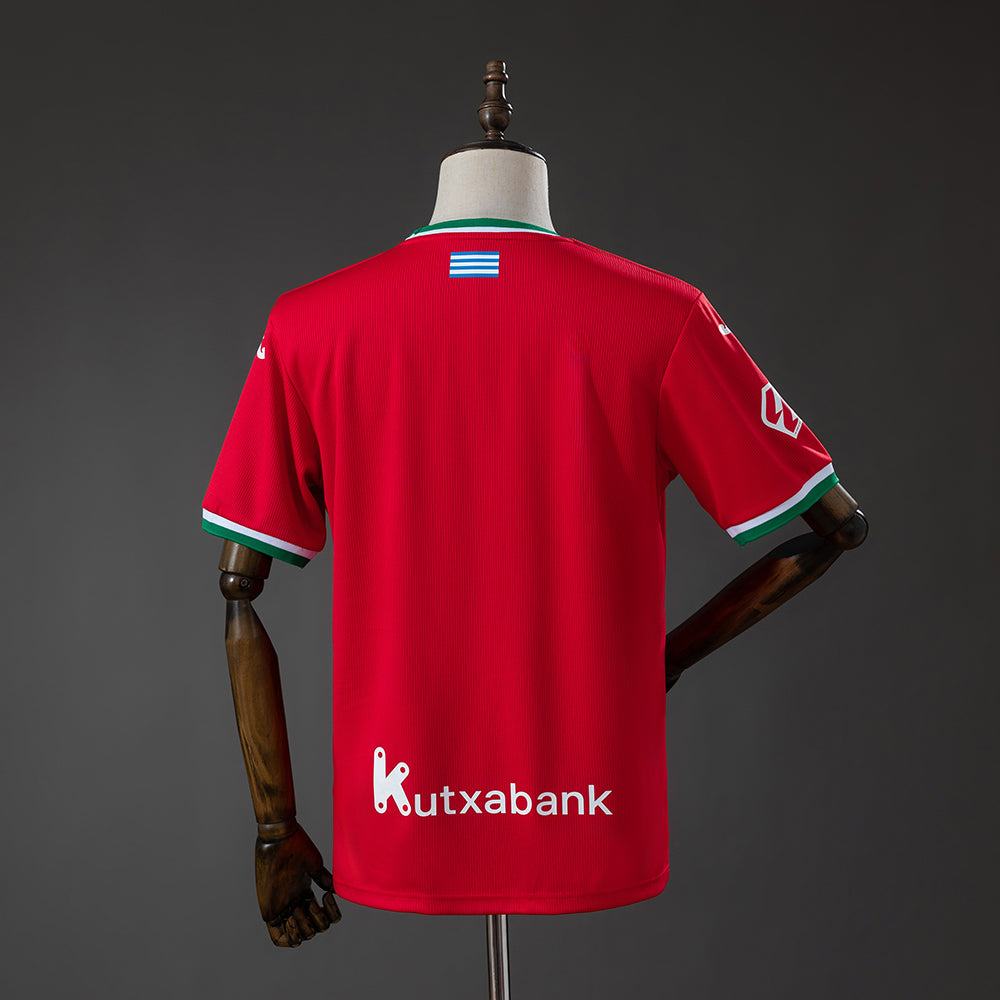 Camisola Real Sociedad 2026-27 Alternativa Vermelha Versão Adepto