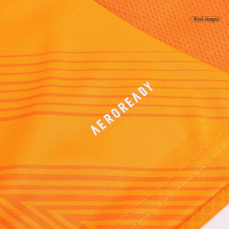 Camisola Real Madrid CF 2024-25 Alternativa Laranja Versão Mulher
