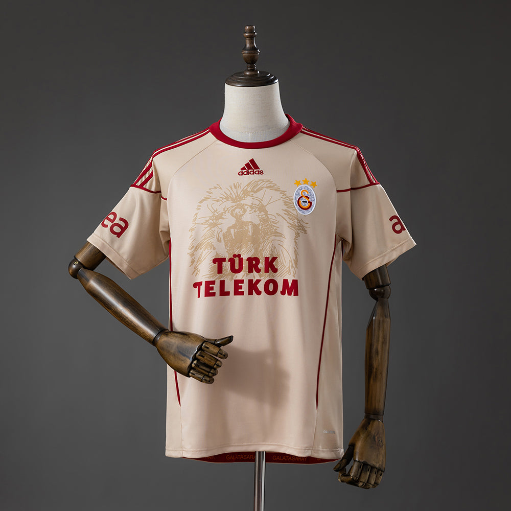 Camisola Galatasaray 2010-11 Alternativa Creme Versão Adepto