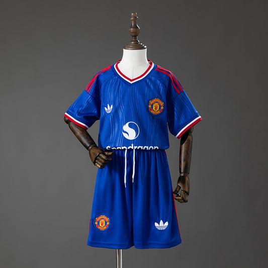Kit Criança M-UNITED 2026-27 Alternativo Azul