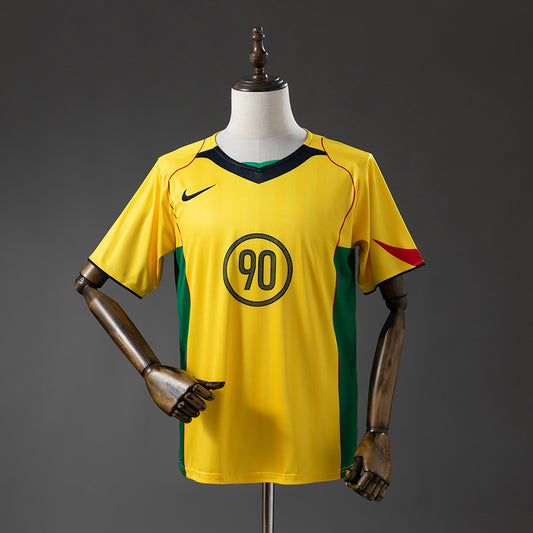 Camisola N.I.K.E. Total90 2025-26 Amarela/Verde