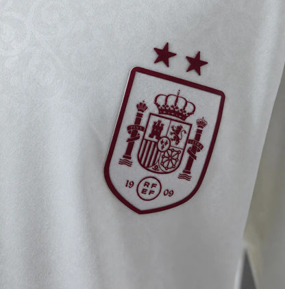 Kit Criança Espanha 2026 Alternativo Branco 2 Estrelas Campeão