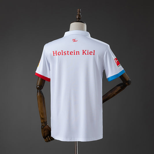 Camisola Holstein Kiel 2024-25 Edição 125º Aniversário Versão Adepto