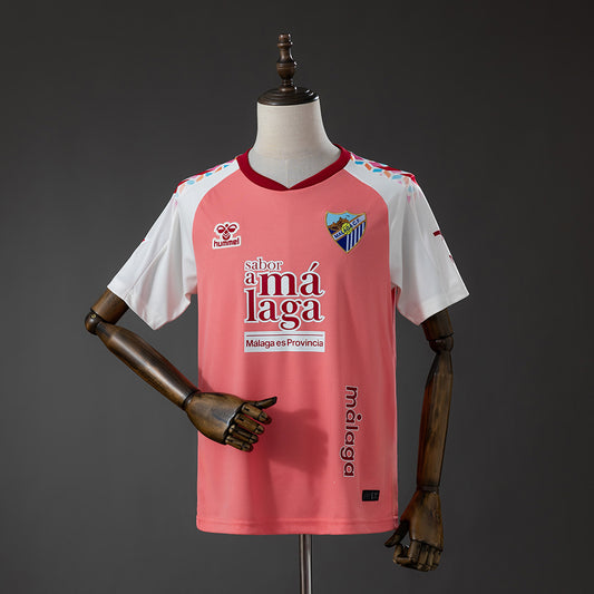 Camisola Malaga FC 2026-27 Alternativa Rosa Versão Adepto