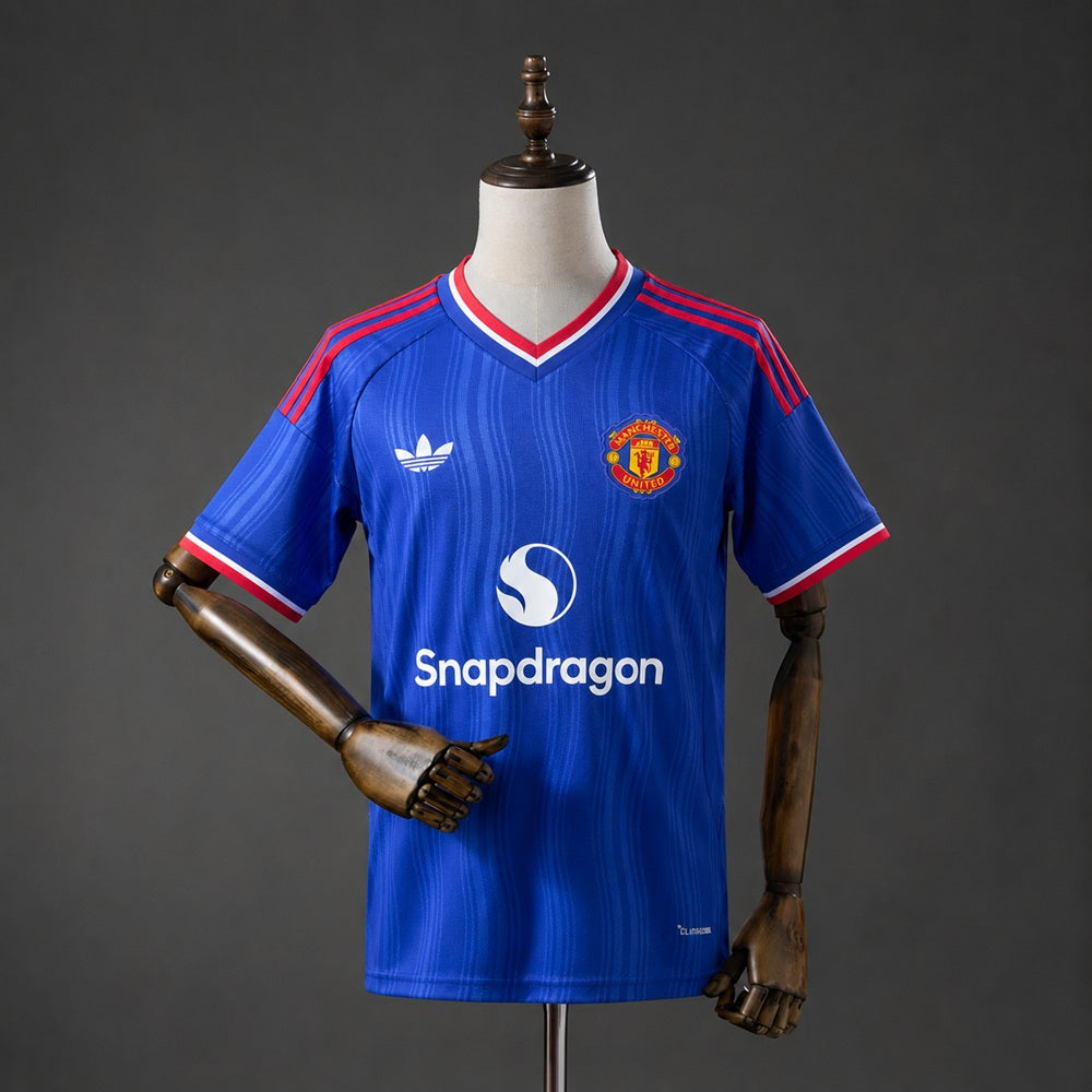 Camisola M-UNITED 2026-27 Alternativa Azul Versão Adepto