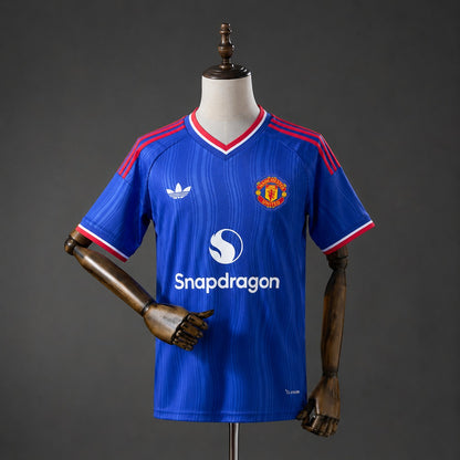 Camisola M-UNITED 2026-27 Alternativa Azul Versão Adepto