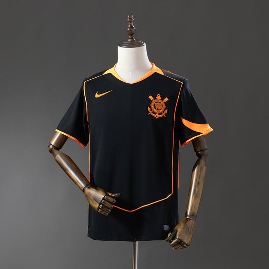 Camisola SC Corinthians 2025-26 Alternativa Preta/Laranja Versão Adepto