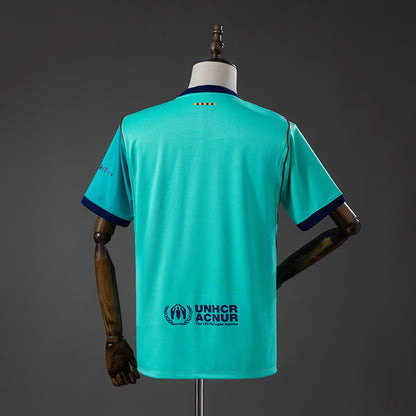 Camisola FC Barcelona 2026-27 Alternativa Azul Versão Adepto