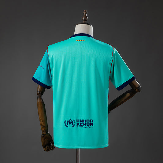 Camisola FC Barcelona 2026-27 Alternativa Azul Versão Adepto
