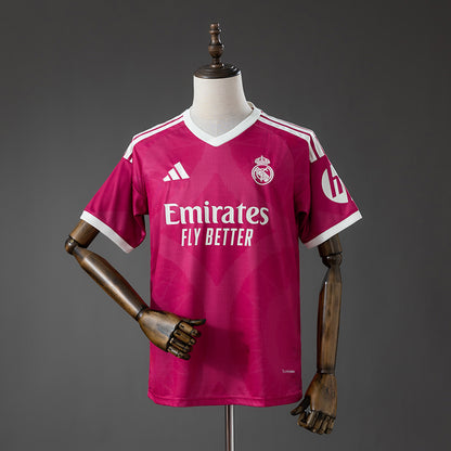 Camisola Real Madrid CF 2026-27 Alternativa Vermelha Versão Adepto