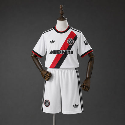 Kit Criança SHE-United 2026-27 Alternativo Branco